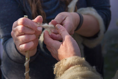 Close-up of hand holding hands