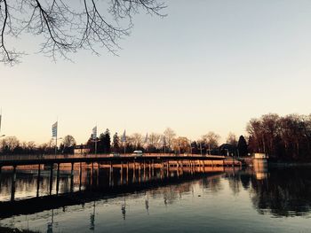 Bridge over river against clear sky