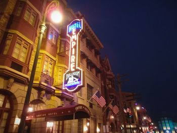 Low angle view of illuminated city at night