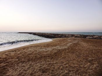 Scenic view of sea against clear sky