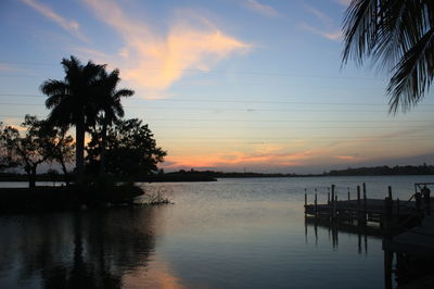 Silhouette of pier at sunset