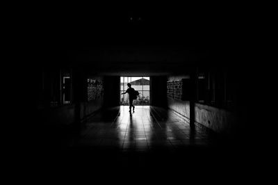 People walking in tunnel