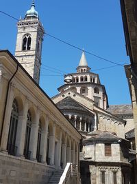 Low angle view of building against clear blue sky