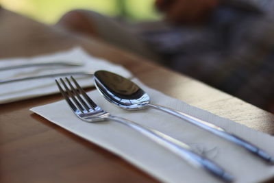 Close-up of hand on table