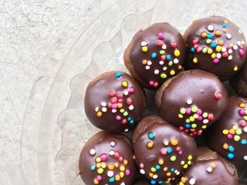 Close-up of multi colored candies on table