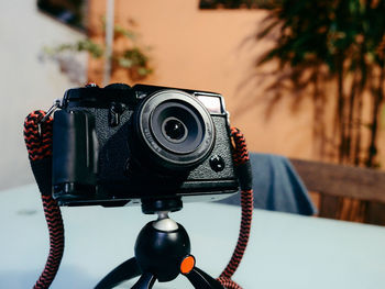 Close-up of camera against wall