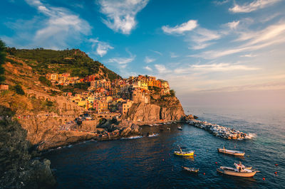 Scenic view of sea and rock formation against sky