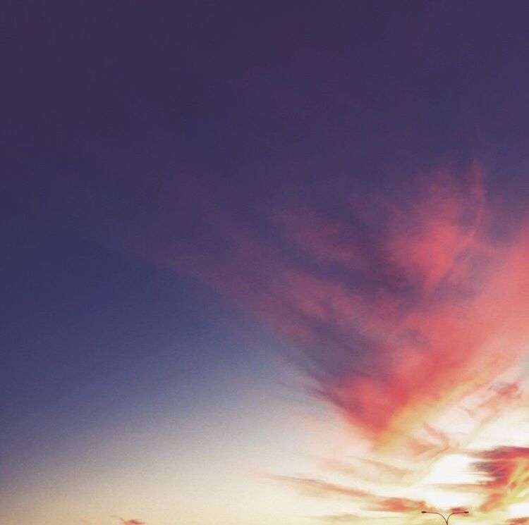 low angle view, sky, sunset, beauty in nature, scenics, tranquility, orange color, cloud - sky, nature, tranquil scene, backgrounds, idyllic, sky only, outdoors, no people, silhouette, blue, dusk, cloud, majestic