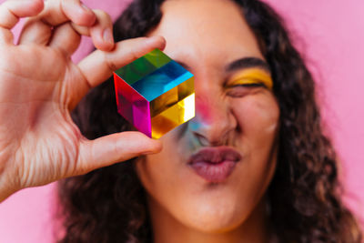 Close-up of woman holding toy blocks