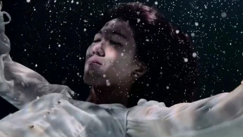 Portrait of a woman in water