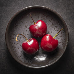 High angle view of cherries in bowl