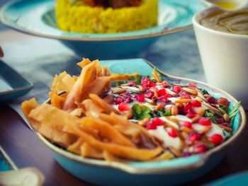 Close-up of pasta served in plate on table