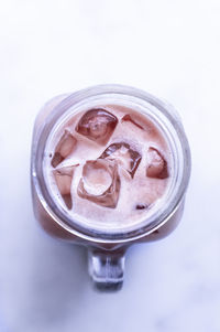 High angle view of ice cream over white background