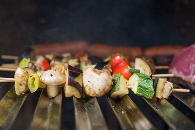 Close-up of meat on barbecue grill