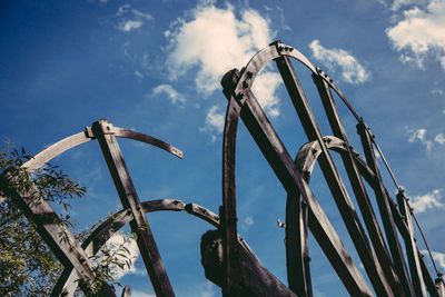 Low angle view of abandoned paddle steamer against sky