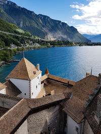 Panoramic view of lake and buildings against sky