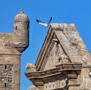 Low angle view of historical building against clear sky