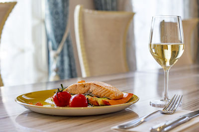 Fruits in plate on table