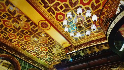 Low angle view of ornate ceiling in building