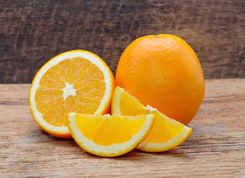 Close-up of oranges against white background
