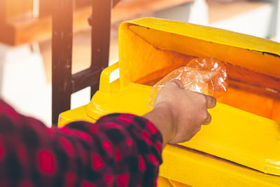 Close-up of man holding ice cream