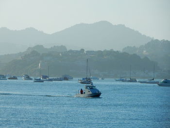 Scenic view of boats in sea