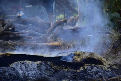 Close-up of smoke caused by charcoal burning with rice husk