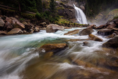 Scenic view of waterfall in forest