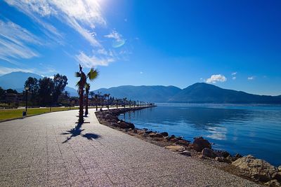 Scenic view of sea against blue sky