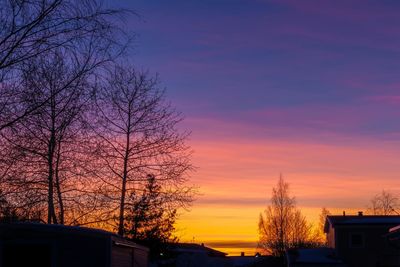 Low angle view of building at sunset