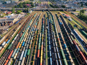 Aerial photo of lots of various wagons. cargo transportation of various goods by rail.