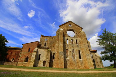 Low angle view of old building against sky