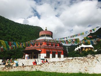 View of temple against cloudy sky