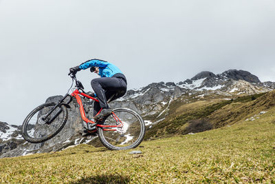 Cyclist man riding mountain bike