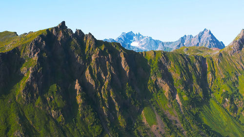 Scenic view of mountains against clear sky