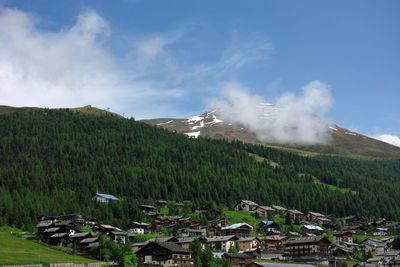 Panoramic view of landscape and buildings against sky