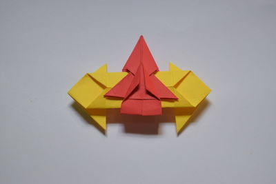 High angle view of multi colored pencils on white background