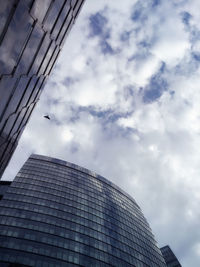 Low angle view of modern building against sky