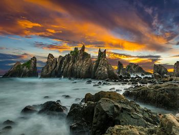 View of dramatic sky over sea during sunset