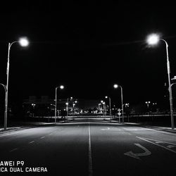 Illuminated road at night