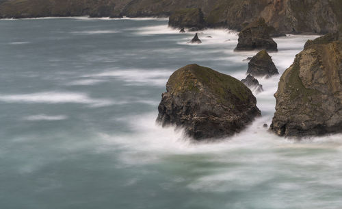 Scenic view of rocks in sea