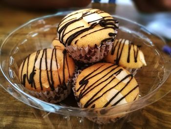 Chocolate sauce drizzled on muffins