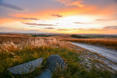 Scenic view of landscape against sky during sunset