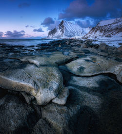 Scenic view of snowcapped mountains against sky