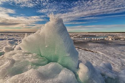 Scenic view of land against sky during winter