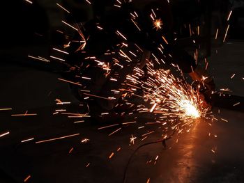 Firework display at night