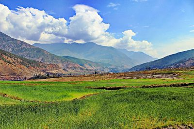 View of landscape against cloudy sky