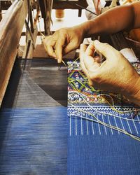 High angle view of man working on table