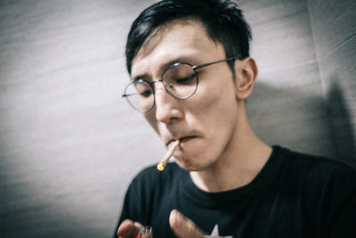 Portrait of young man looking away