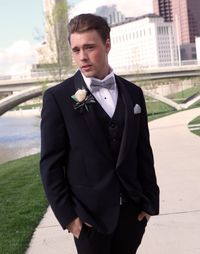 Mid adult man standing in park